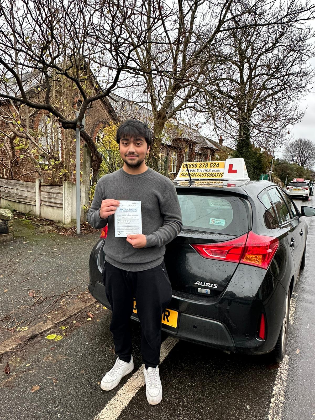 Learner celebrating a driving test pass with Sara